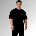 Playera de hombre para gym - underrated discipline - negra - corte oversize - vista frontal