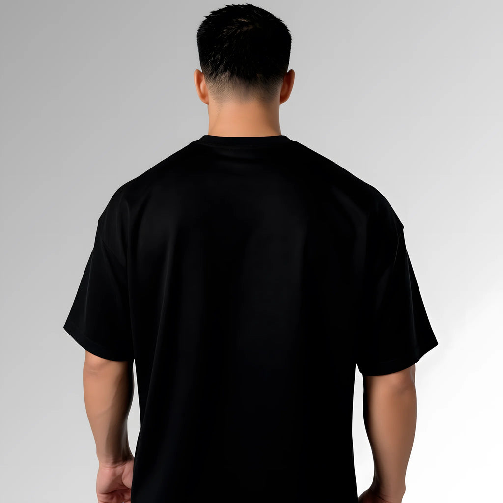 Playera de hombre para gym - underrated discipline - negra - corte oversize - vista trasera